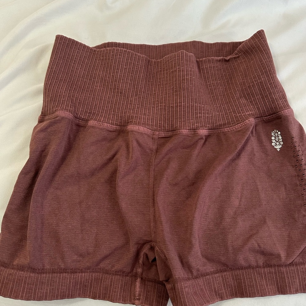 Free people “good karma running shorts” burgundy in the M/L size